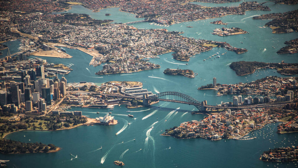 Aerial view of Sydney harbour and surrounding suburbs.